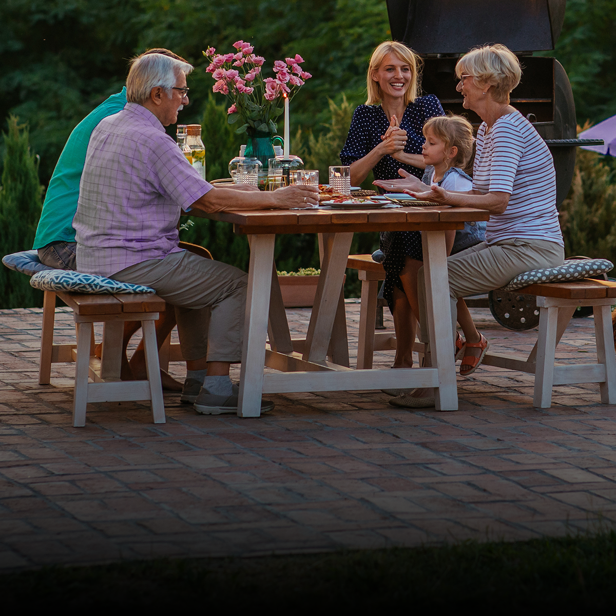 Family having a meal outdoors